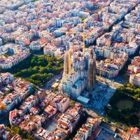 Aerial view of cityscape of Barcelona, Eixample district and Sagrada Familia